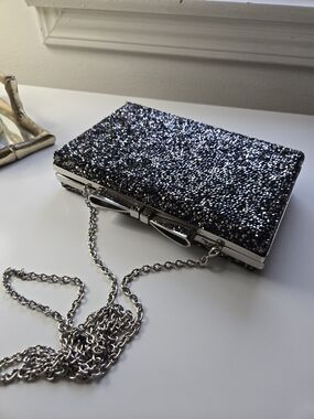 Glitter Bow-Accent Evening Clutch in Black and Silver
